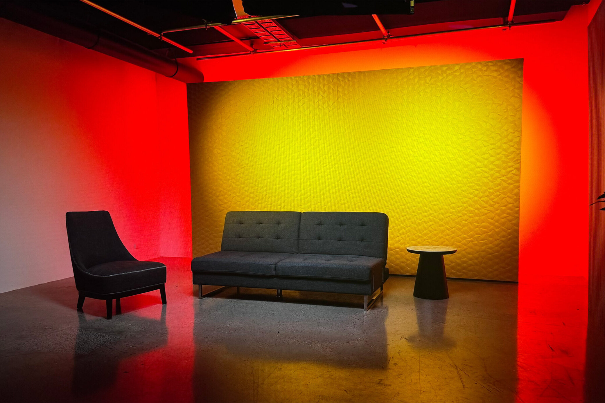 Sydney TV Studio Hire with yellow and red atmospheric lighting.